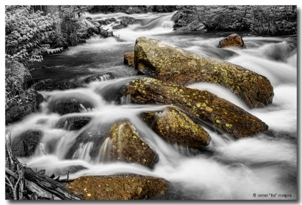 Cascading Water and Rocky Mountain Rocks